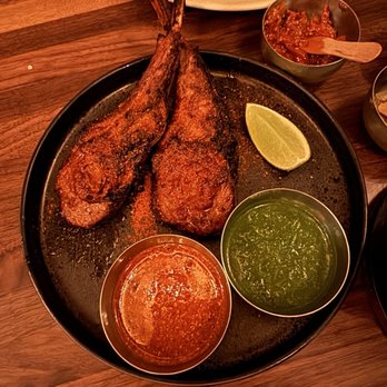 Adda Indian Canteen signature dishes Baby Goat BiryaniLamb ChopPeppercorn Bone Marrow